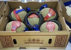 Fresh hami melons, branded by Xianfeng Fruit Company.